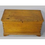 A 19TH CENTURY CAPE YELLOWWOOD KIST, the moulded top enclosing a candle box and storage space, the
