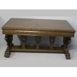 AN EARLY 20TH CENTURY OAK CENTRE TABLE, in the Italianate style, the rectangular top with a