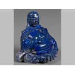 A 19TH CENTURY CHINESE CARVING OF HOTEI, in Lapis Lazuli, 10cm high.