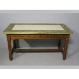 A 19TH CENTURY DUTCH KITCHEN TABLE, the rectangular top decorated in sage and cream tiles with a