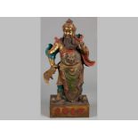 A 19TH CENTURY IMPOSING GILT BRONZE AND METAL FIGURE OF GUANDI, The Ferocious God of War, wearing