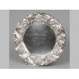 A .835 STD SILVER PRESENTATION TRAY, of circular form, border embossed with scrolls, swags and