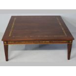 A PIERRE CRONJE SQUARE COFFEE TABLE, in Georgian-style, the top inlaid in bold cross-banding,