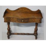 A VICTORIAN MAHOGANY SERVER, the serpentine top with back and side rails above a heavy beaded