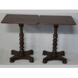 A PAIR OF VICTORIAN MAHOGANY SIDE TABLE, the rectangular tops supported on ring turned columns,