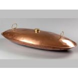 A 19TH CENTURY COPPER AND BRASS BED WARMER, of oval shape and large proportions, 75cm long.