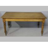 A 19TH CENTURY CAPE YELLOWWOOD DINING TABLE, the three-plank top above a beaded frieze, standing