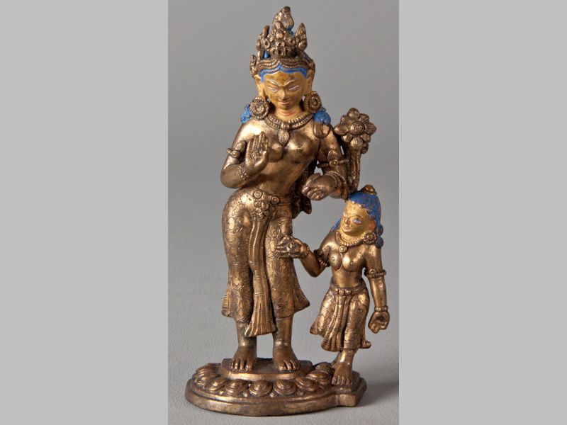 AN 18TH/19TH CENTURY TIBETAN GILT-BRONZE FIGURE OF A BODHISATVA AND HER ATTENDANT, the finely cast