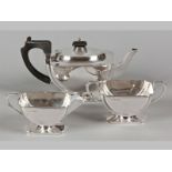 A GEORGE V THREE PIECE SILER TEA SET, BIRMINGHAM 1936, E.W.H., comprising; teapot, creamer and sugar