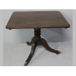 A GEORGE III MAHOGANY TILT-TOP TABLE, the well figured top supported on a ring turned column with