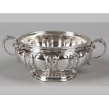 A GEORGE V SILVER SUGAR BOWL, LONDON 1915, MAPPIN & WEBB, gadrooned rim, twin C-scroll handles, with