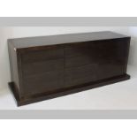 A PIERRE CRONJE STAND OAK GEOMETRIC SIDEBOARD, the rectangular top above three graduated drawers,