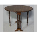 A VICTORIAN MAHOGANY SUTHERLAND TABLE, the oval top with deep leaves supported on six bobbin
