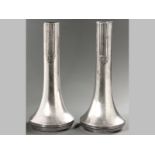 A PAIR OF SILVERPLATE WMF ART NOUVEAU NARROW NECK VASES, the necks embossed with shield forms, the