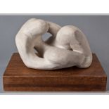 LAURENCE ANTHONY CHAIT (1943-), RECLINING FIGURE. Stone carving. Standing on a rectangular wooden