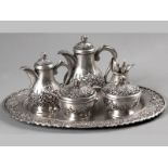 A DJOKJA .800STD SILVER TEA AND COFFEE SERVICE, comprising; coffee pot, tea pot, sugar basin with