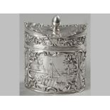 A DUTCH .835STD SILVER OVAL FORM TEA CADDY, the hinged top with flame form finial, the entire