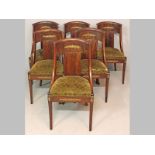 A SET OF SIX ANTIQUE FRENCH MAHOGANY DINING CHAIRS, the dished back-rails above rectangular