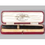 A WATERMAN'S IDEAL FOUNTAIN PEN, with a 14ct yellow gold nip, complete with Moroccan leather