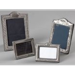 A COLLECTION OF FOUR SILVER PHOTOGRAPH FRAMES, LONDON 1969, J.B.L., LONDON 1972, K.F. LTD.,