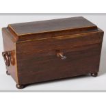 A REGENCY ROSEWOOD TEA CADDY, of sarcophagus form, the stepped lid with satinwood stringing, the