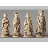 A GROUP OF FOUR FINELY CARVED IVORY CHESS PIECES, EARLY 19TH CENTIRY, minor losses, 10cm height of