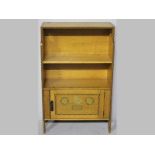 AN EDWARDIAN OAK BOOKSHELF, the top and sides inlaid with chevron banding, with two shelves above