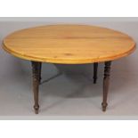 A CAPE STINKWOOD AND YELLOWWOOD TABLE, the circular top with a double moulding standing on a