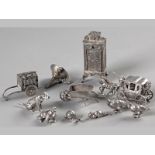A COLLECTION OF ELEVEN SILVER MINIATURES, VARIOUS DATES AND MAKERS, comprising; an armoire, coach,