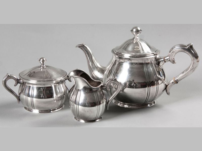 A CONTINENTAL .830STD SILVER THREE PIECE TEA SET, comprising; teapot, creamer and sugar basin,