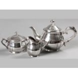 A CONTINENTAL .830STD SILVER THREE PIECE TEA SET, comprising; teapot, creamer and sugar basin,