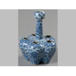 A CHINESE BLUE AND WHITE TULIPIER, the body moulded in five sections and a central column, the