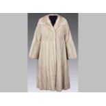 A WHITE MINK LADIES FUR COAT, by Stefanie Viner, silk lined.