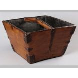 A JAPANESE WOOD AND IRON TAPERING SQUARE BUCKET, of village manufacture, the blonde wood with iron