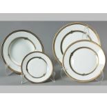 A CHRISTOFLE "RUBAN" PATTERN DINNER SERVICE, comprising: twelve dinner plates, eleven fish plates,