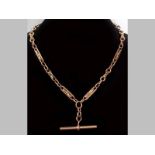 A 9CT YELLOW GOLD ALBERT CHAIN, fancy links complete with two dog clasps and a T-bar, 42cm long,