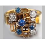 AN 18CT YELLOW GOLD, DIAMOND AND SAPPHIRE RING, four claw set diamonds and four sapphires on