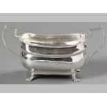 A REGENCY SILVER SUGAR BASIN DUBLIN 1814, JAMES LE BASS, of large proportions, with gadrooned rim,