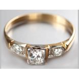 AN 18CT YELLOW GOLD AND DIAMOND RING, three claw set diamonds on solid shank, diamonds of