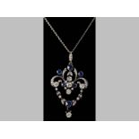 AN EDWARDIAN YELLOW GOLD, WHITE GOLD, DIAMOND AND SAPPHIRE PENDANT, set with fifty-two rose-cut