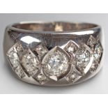 AN 18CT WHITE GOLD AND DIAMOND RING, claw set with thirteen diamonds of approximately 1cts in total,