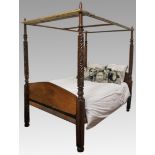 A 20TH CENTURY MAHOGANY FOUR POSTER BED, the rectangular tester above four turned and carved pillars