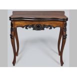 A 19TH CENTURY CONTINENTAL MAHOGANY CARD TABLE, the serpentine top opening to reveal a baize lined
