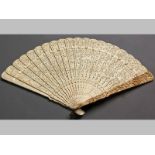 A VERY FINE CHINESE IVORY FAN, FIRST QUARTER OF THE 19TH CENTURY, CIRCA 1820, with nineteen sticks