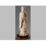 A CHINESE IVORY LARGE STANDING FIGURE, 19TH CENTURY, CIRCA 1880, of a Confucian Philosopher, the