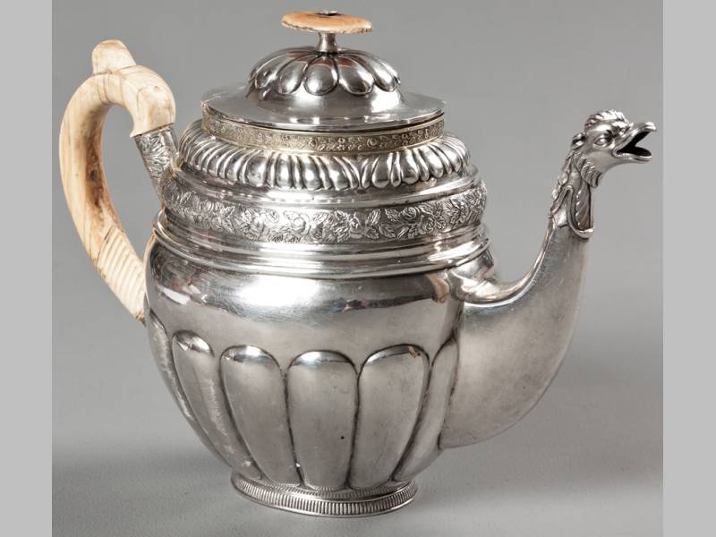 A MID-19TH CENTURY RUSSIAN SILVER TEAPOT, 1850, E.L., hinged cover with removable ivory finial, C-