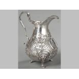 A VICTORIAN SILVER CREAMER LONDON 1855, MAKERS MARKS INDECIPHERABLE, fold-over rim, with C-scroll