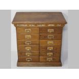 AN EARLY 20TH CENTURY AMERICAN OAK FILING CABINET, by Rockwell's, Chicago, USA. The moulded top