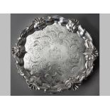 A GEORGE IV SILVER SALVER LONDON 1829, W.K.R., applied serpentine border with shell decoration,