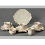 A SIX PLACE BELLEEK MILLENIUM 2000 TEA-SET, comprising: six cups and saucers, six side plates, a